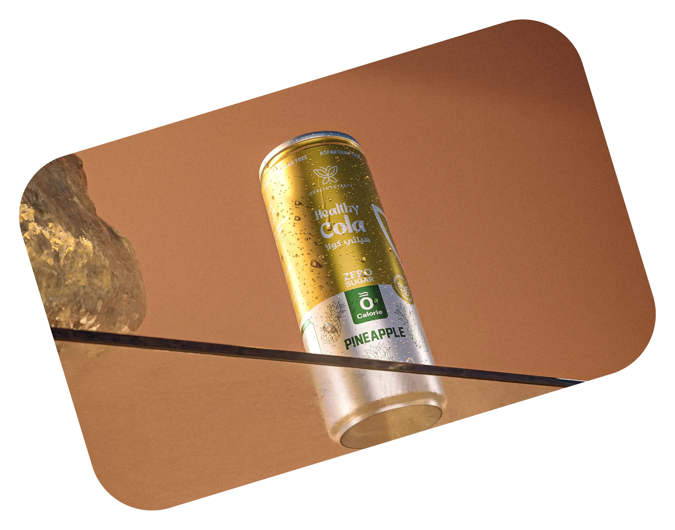 pinpples cola can. on glass shelf